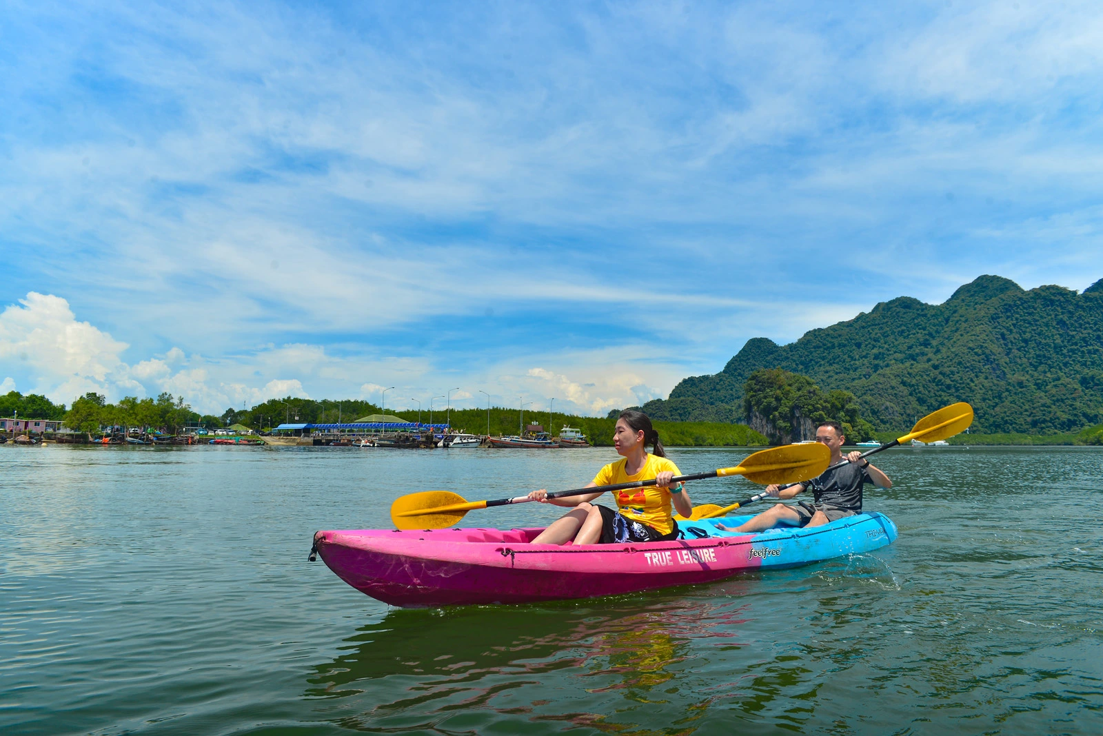 A woman and a man kayaking at Ao Thalane Kayaking
