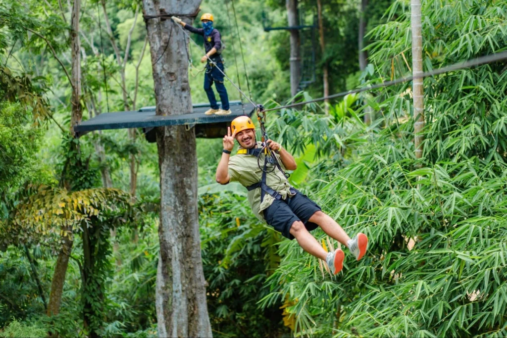 Tourists enjoying the Flying Fox zipline during a Phuket quad tour adventure