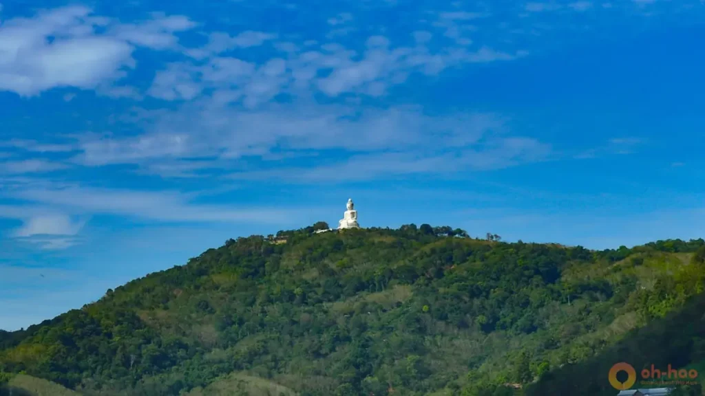 Big Buddha rising above a forested hill, a scenic stop for things to do in Phuket family itineraries