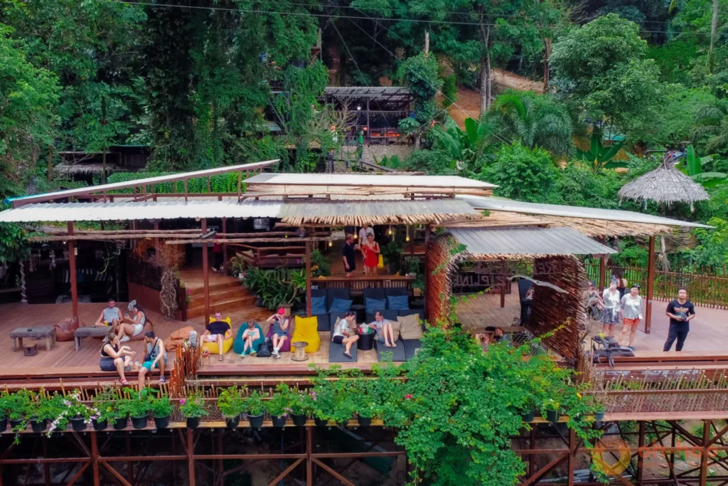 Guests relaxing at the Tree Bridge Coffee stop midway through the Koh Samui zipline adventure