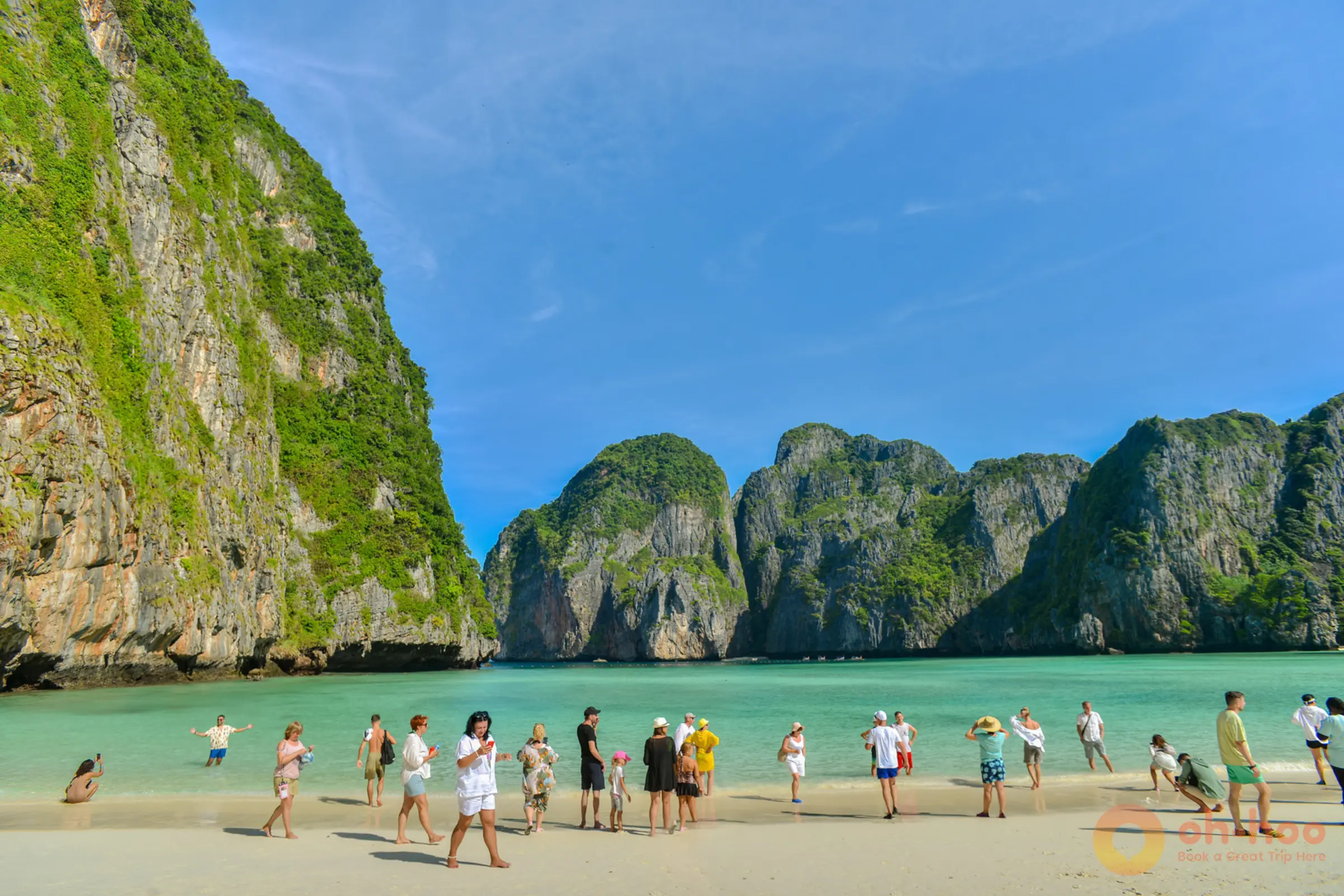 Scenic view of Maya Bay beach with tourists on a Phi Phi tour from Phuket