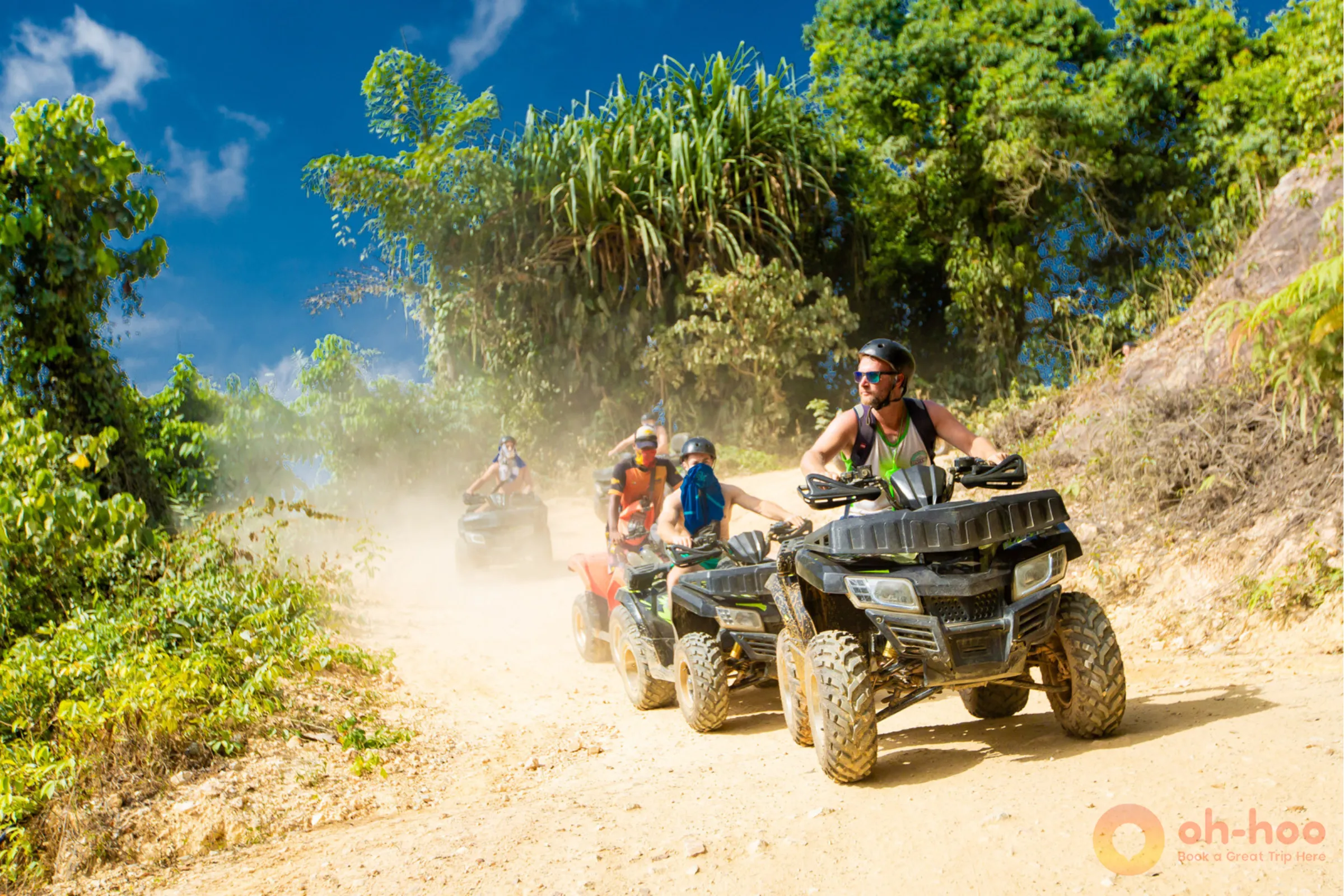 Tourists riding quad bikes off-road on a Koh Samui ATV safari tour