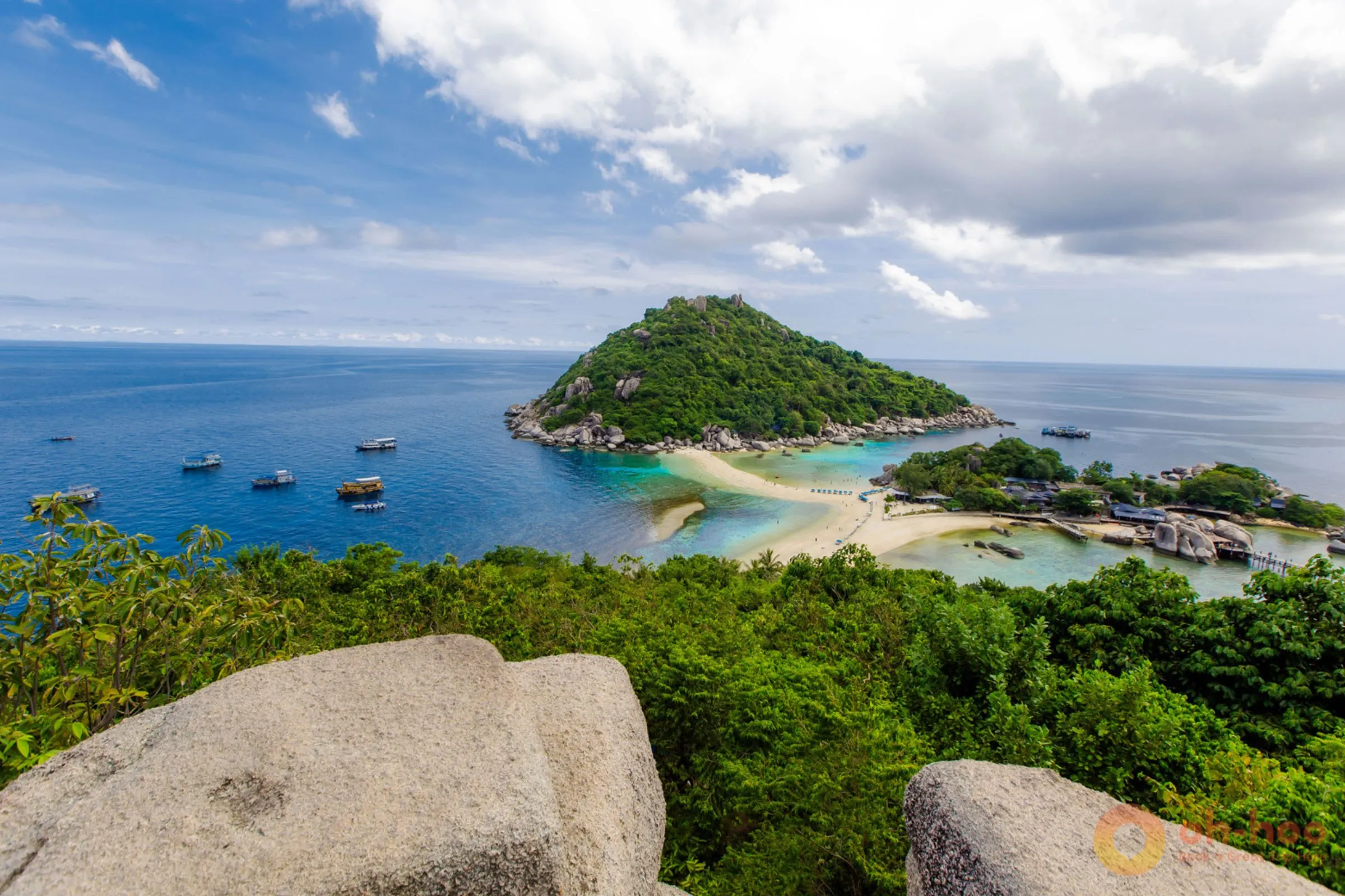 The iconic Koh Nang Yuan viewpoint, three islands linked by a white sandbar in turquoise water near Koh Tao