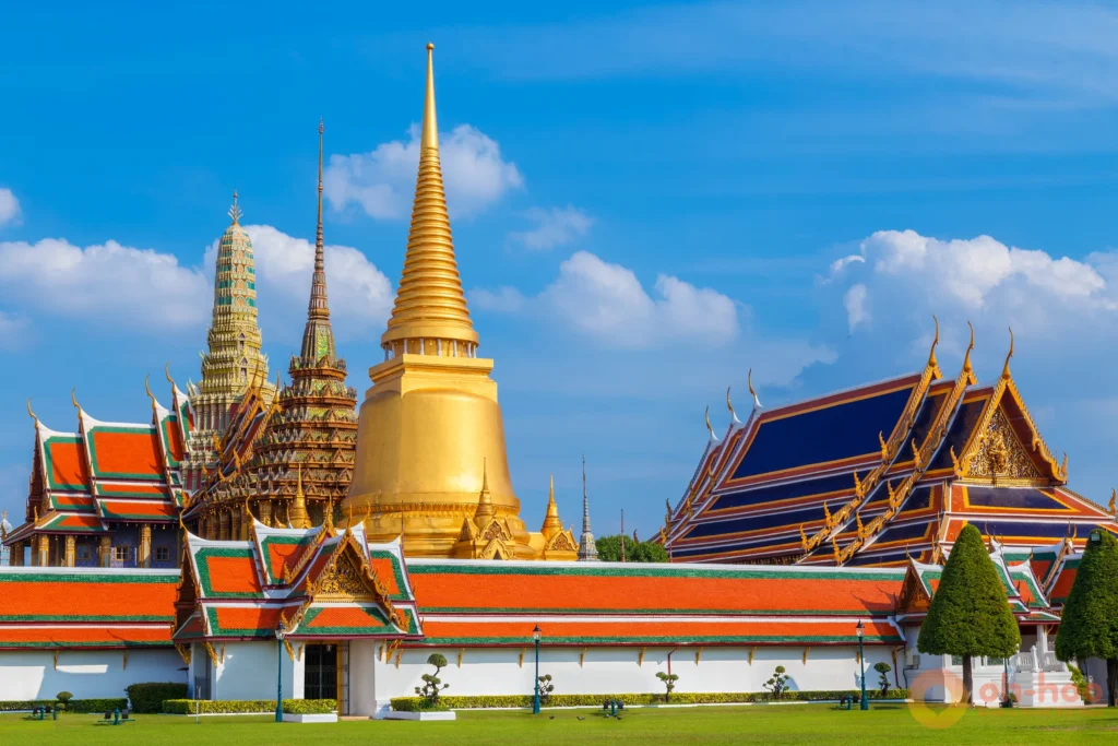 Golden stupa of Phra Sri Rattana Chedi and main Ordination Hall at Grand Palace Bangkok