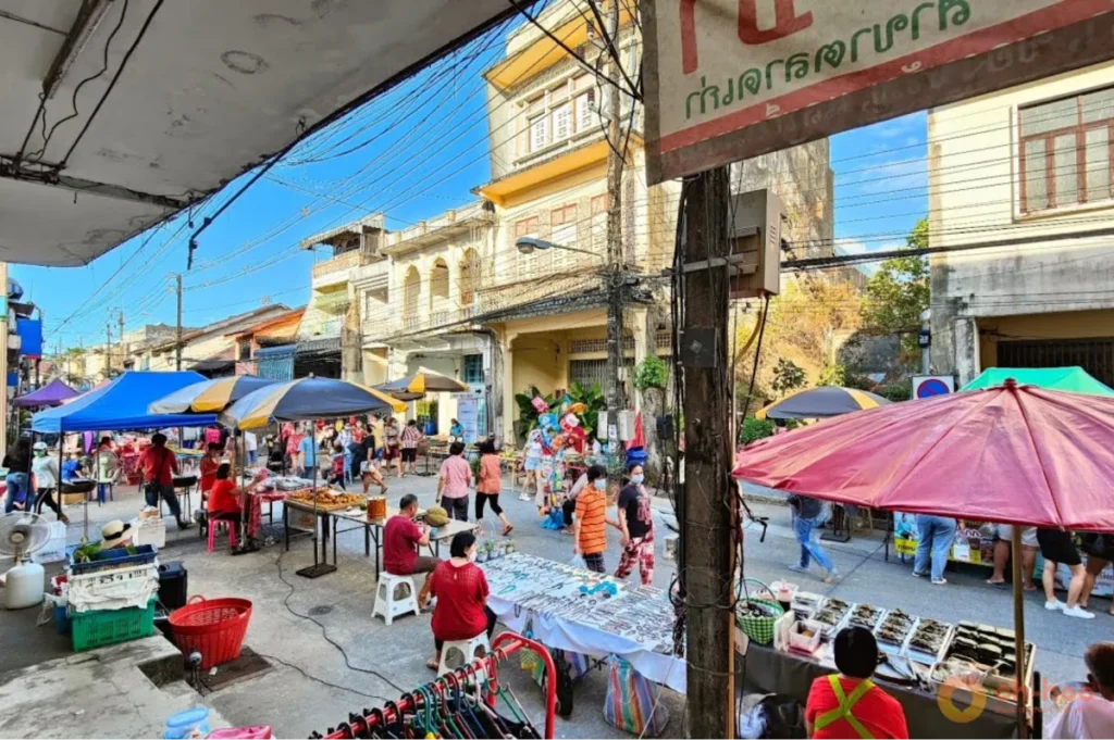 Takua Pa Old Town market with historic architecture, local vendors, and street life near Khao Lak Thailand.