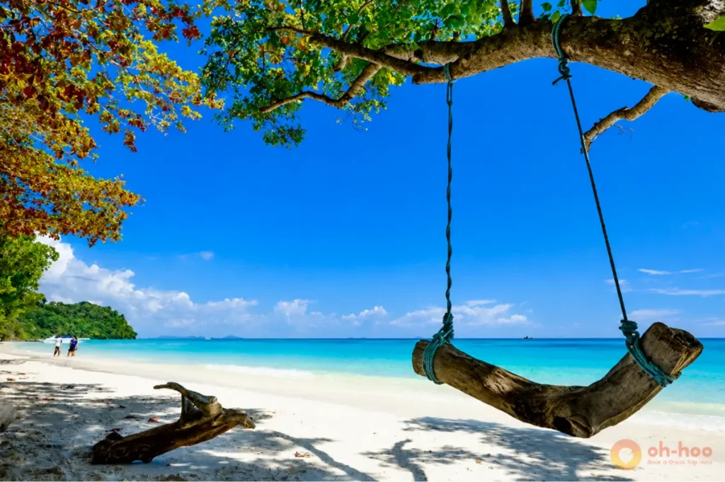 Koh Lanta beaches with white sand, turquoise water and a wooden swing in Krabi, Thailand