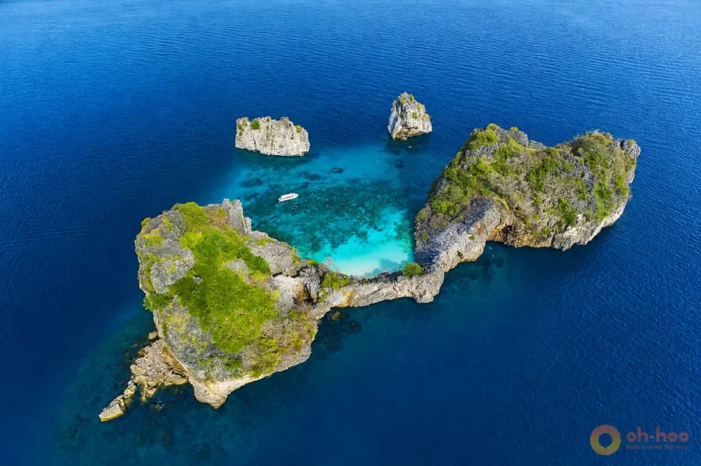 Koh Rok and Koh Haa with turquoise waters, limestone islets and clear snorkeling spots near Koh Lanta