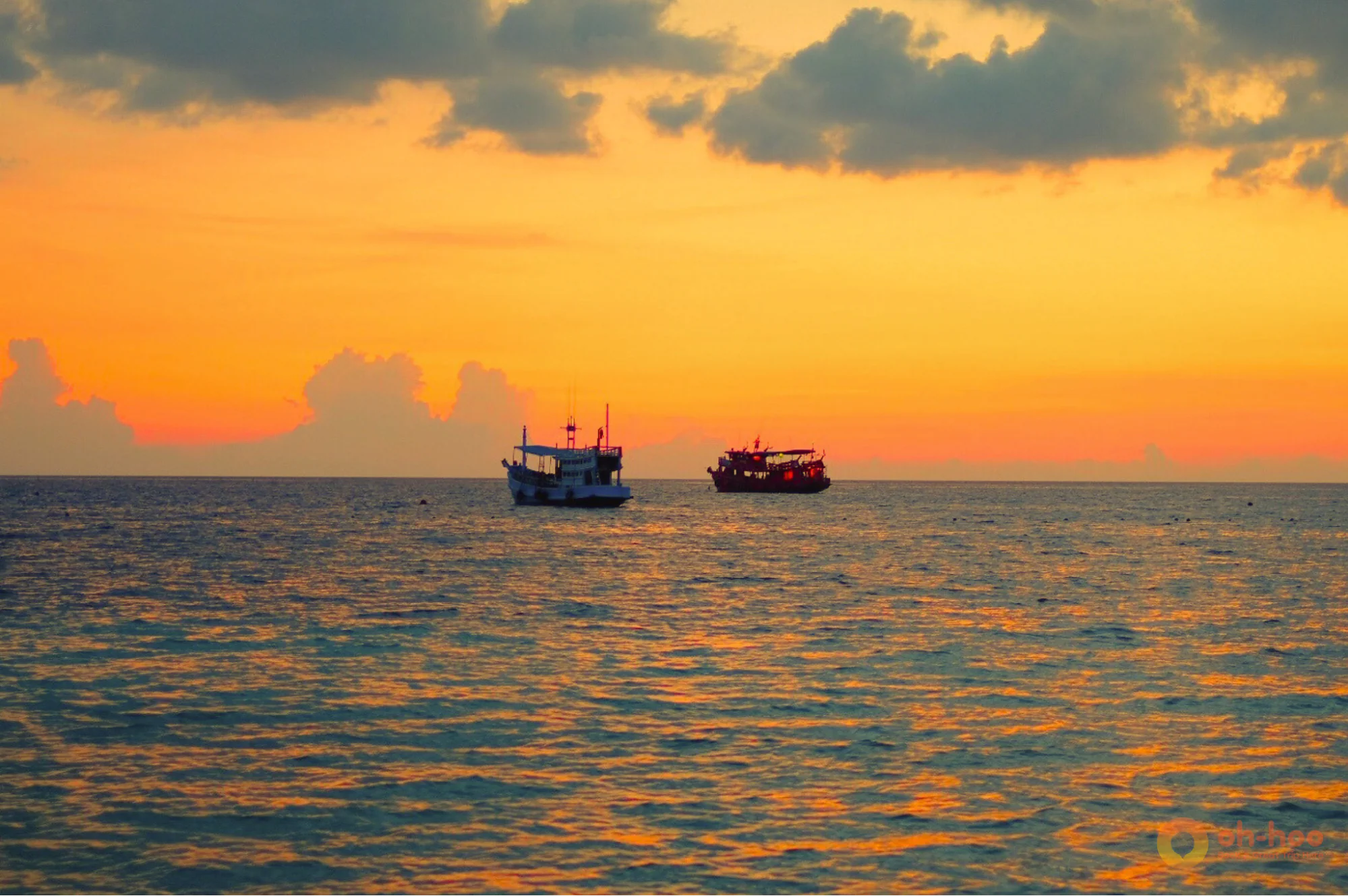 Solo traveler enjoying a peaceful sunset on Koh Phangan