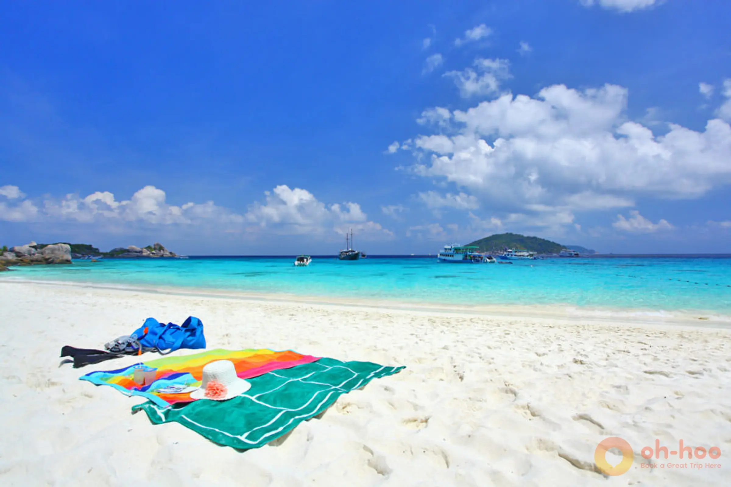 pristine white sand beach and turquoise water at Coral Island Phuket