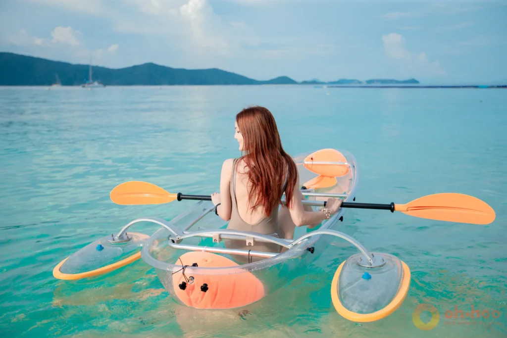 Clear kayak floating over turquoise transparent water at Coral Island Phuket