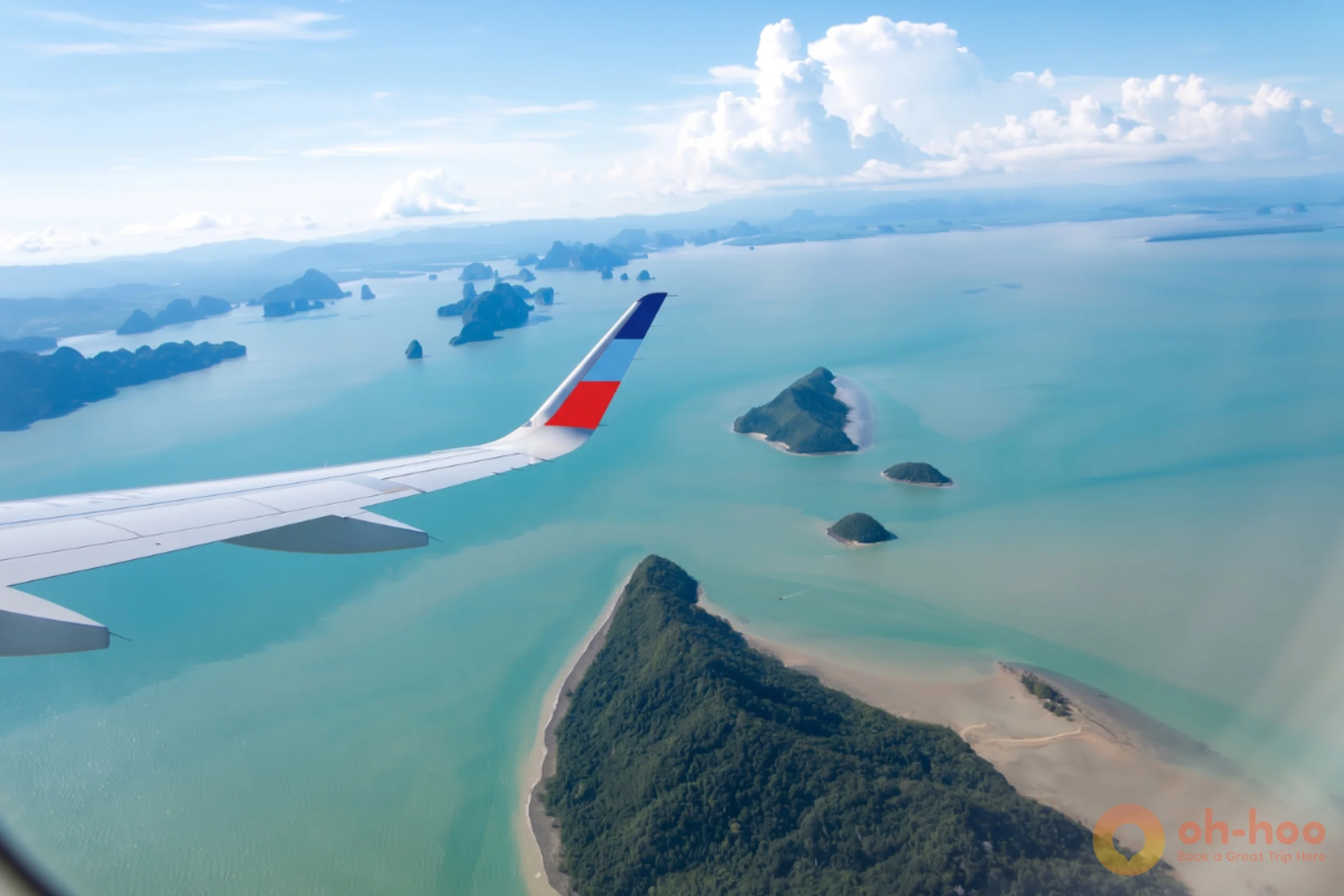 Turboprop aircraft in flight over the blue sea and scattered limestone islands of southern Thailand