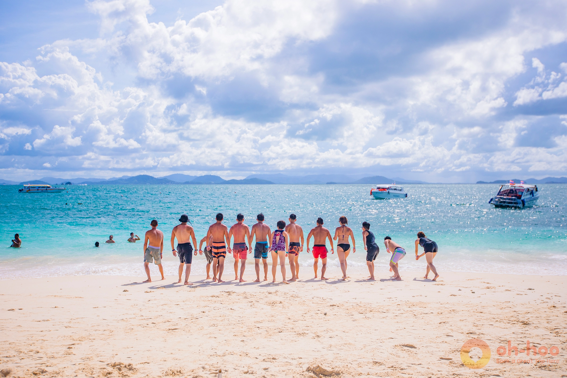 Clear turquoise water and white sand fringing one of the Khai islands off Phuket