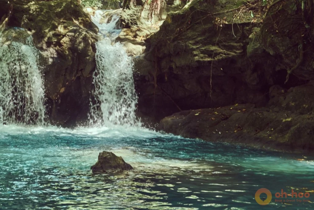 Natural rock pool below a waterfall in the jungle interior of Koh Phangan