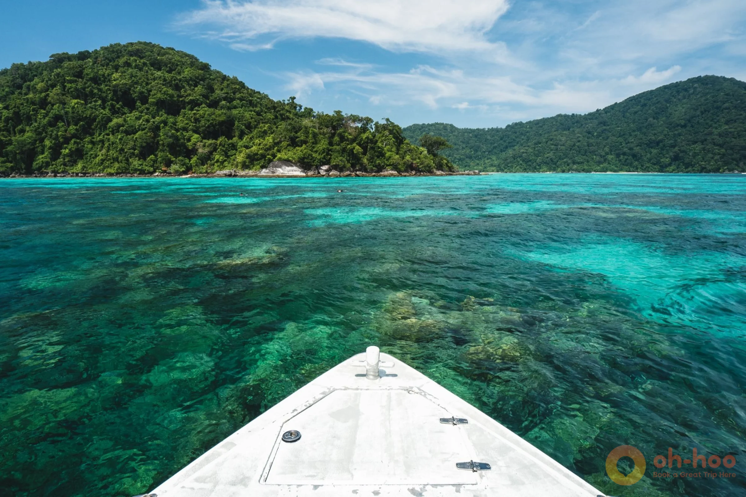 Clear shallow water over coral reef at a bay in Mu Ko Surin National Park