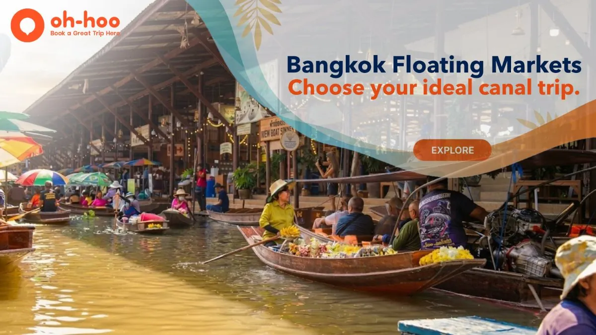 Passengers ride in wooden boats navigating a bustling canal market during a popular floating market bangkok trip.