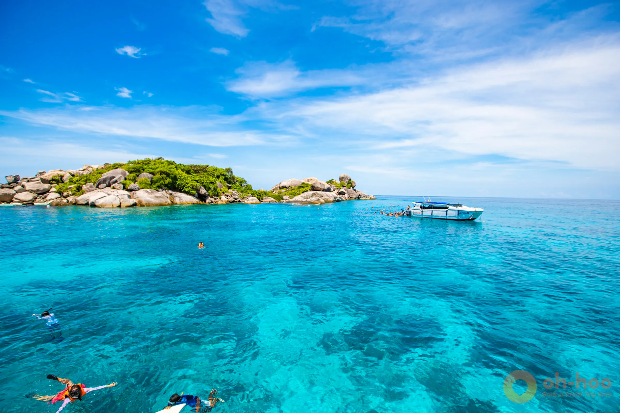 Granite boulders and turquoise water at the Similan Islands on a clear day
