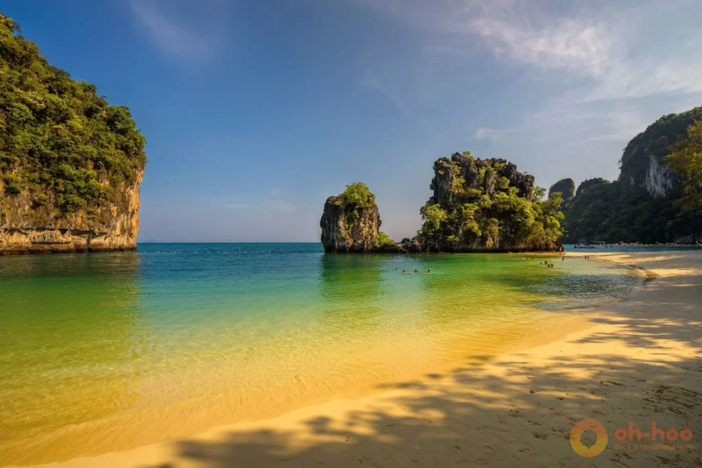 Turquoise lagoon enclosed by limestone cliffs at Koh Hong near Krabi
