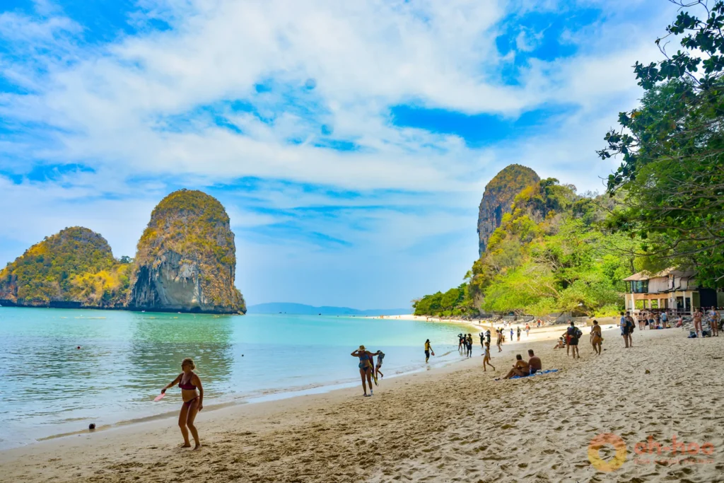 Clear calm sea and limestone karsts near Krabi during high season