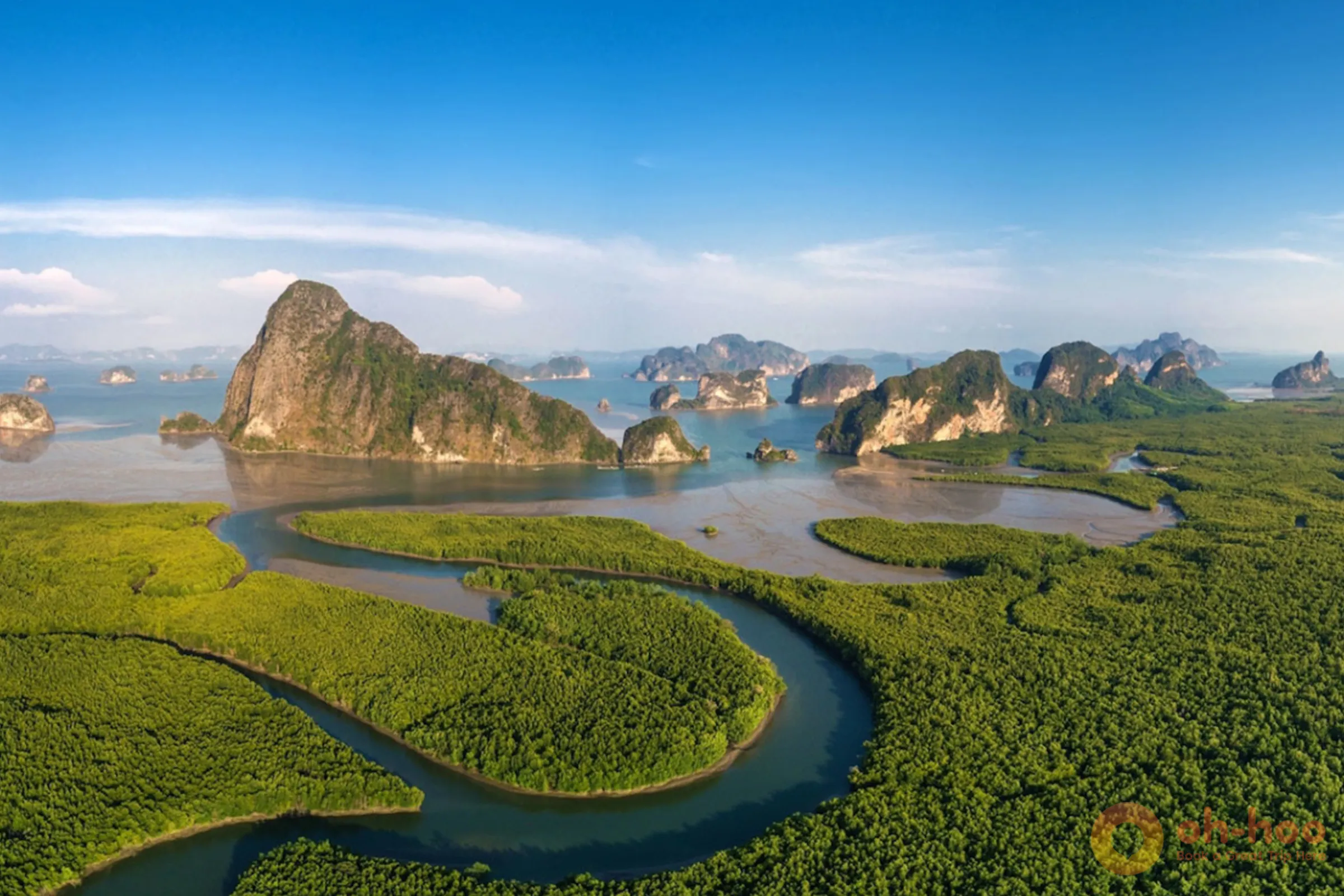 Aerial view of emerald waters and towering limestone karsts in Phang Nga Bay, Southern Thailand